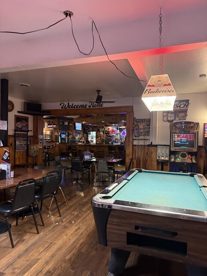 Simple dining room inside a neighborhood tavern.