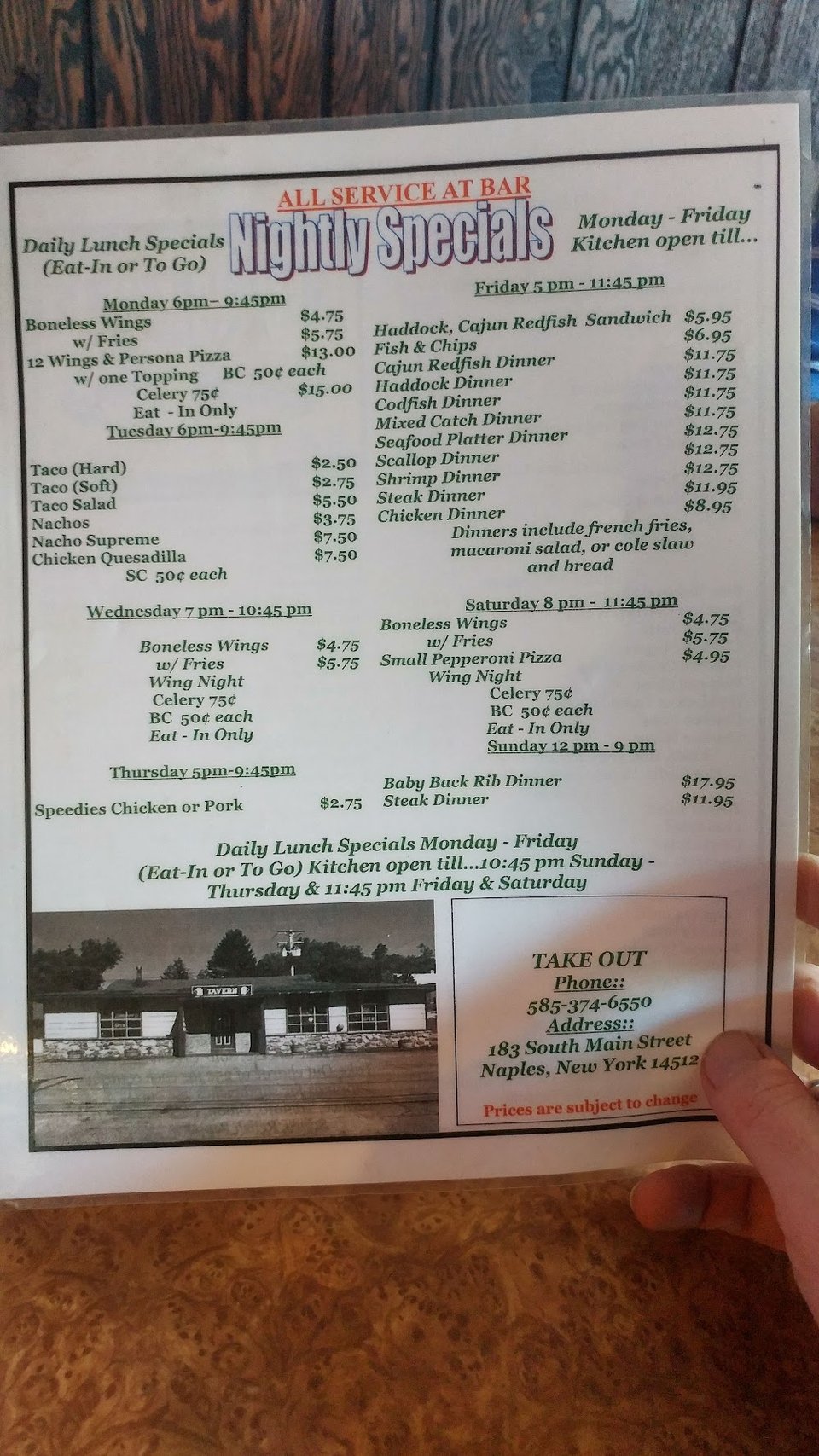 Casual bar menu with salads and sandwiches.